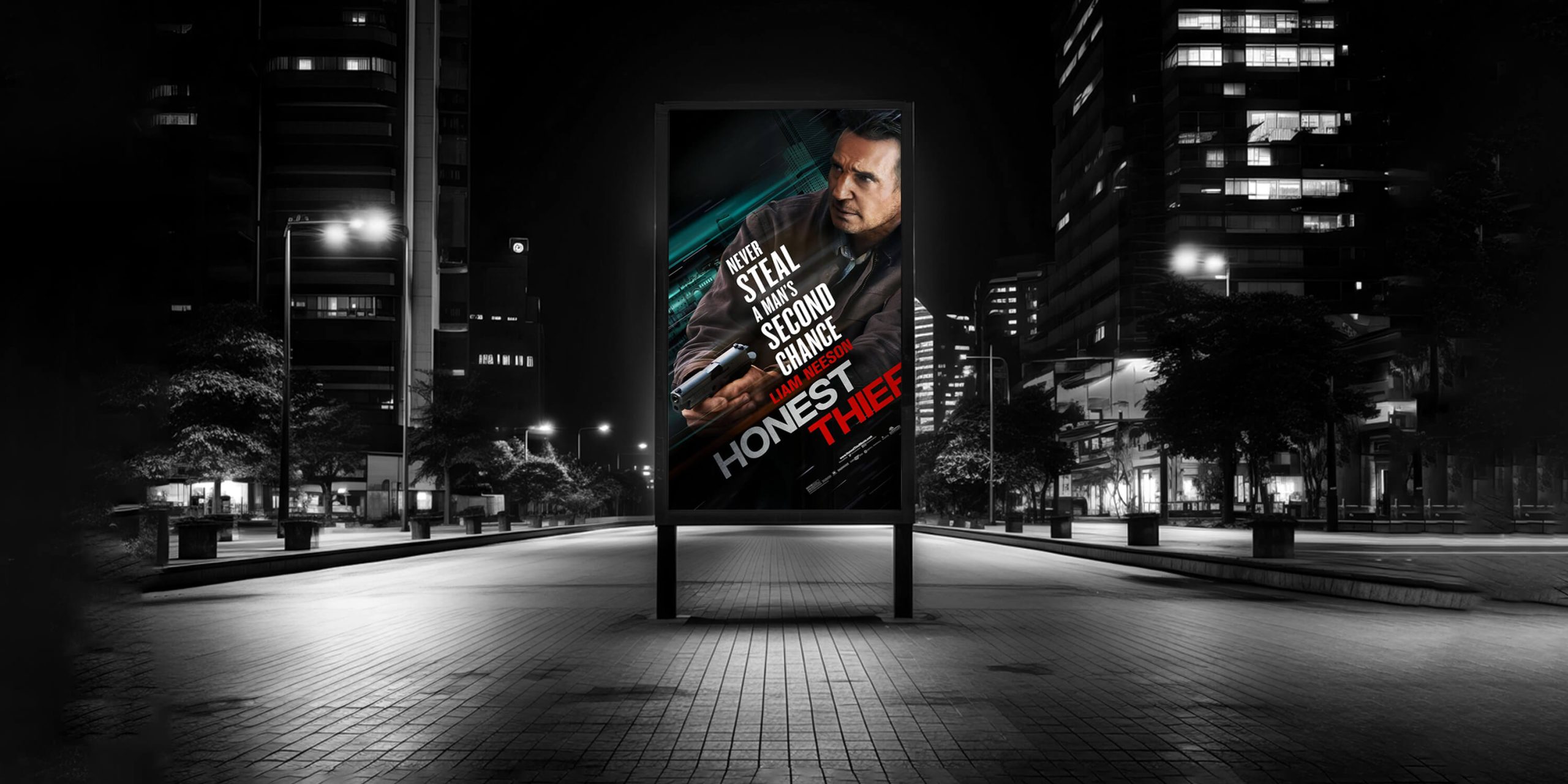 A digital billboard on a city street at night — programmatic out-of-home.